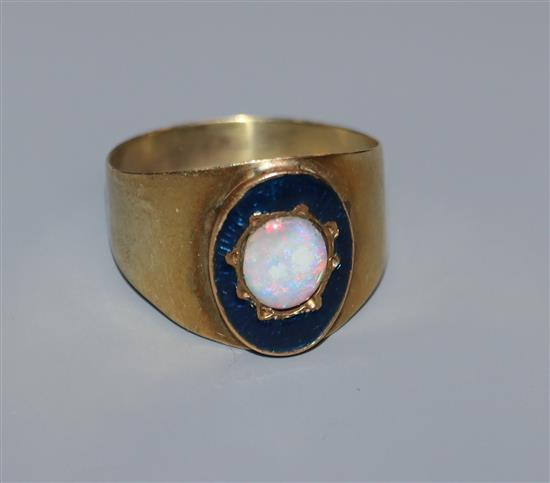 A George III yellow metal, white opal and enamel mourning ring, for John Bell, 1807, (opal later mounted?), size O.